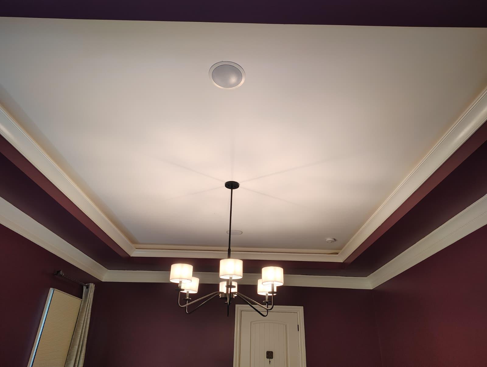 Detail of painted tray ceiling and crown molding finish