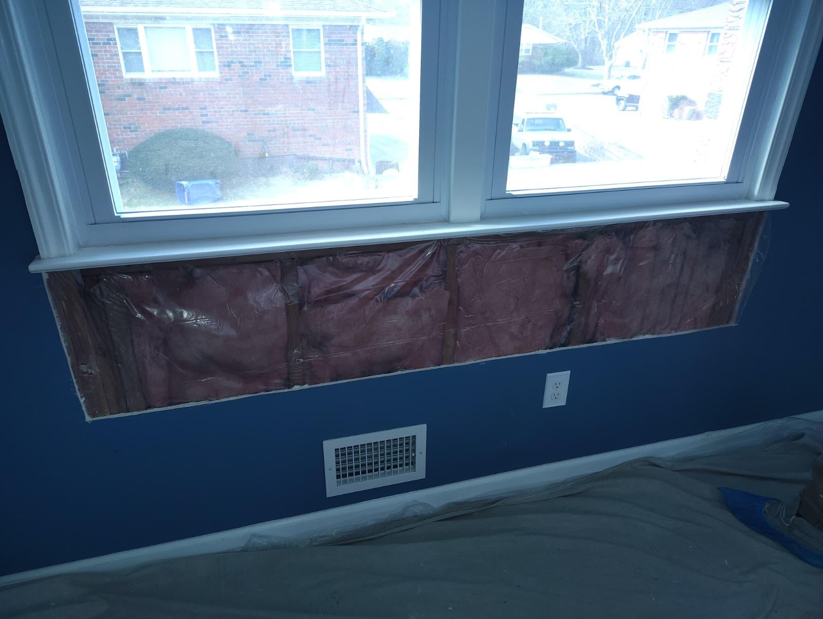 New insulation vapor barrier in place, ready for drywall installation