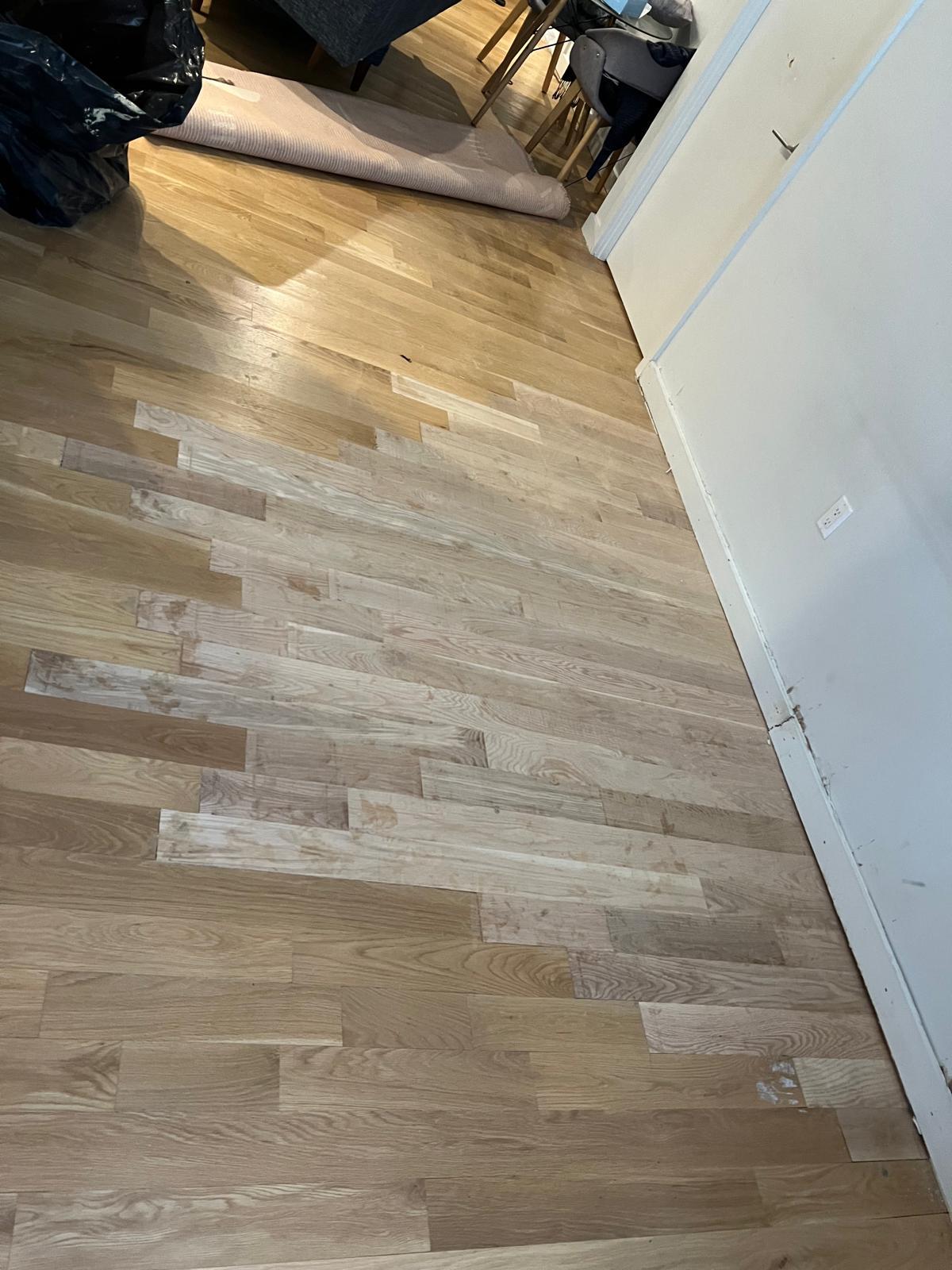 Finished hardwood floor installation ready for sanding and finishing